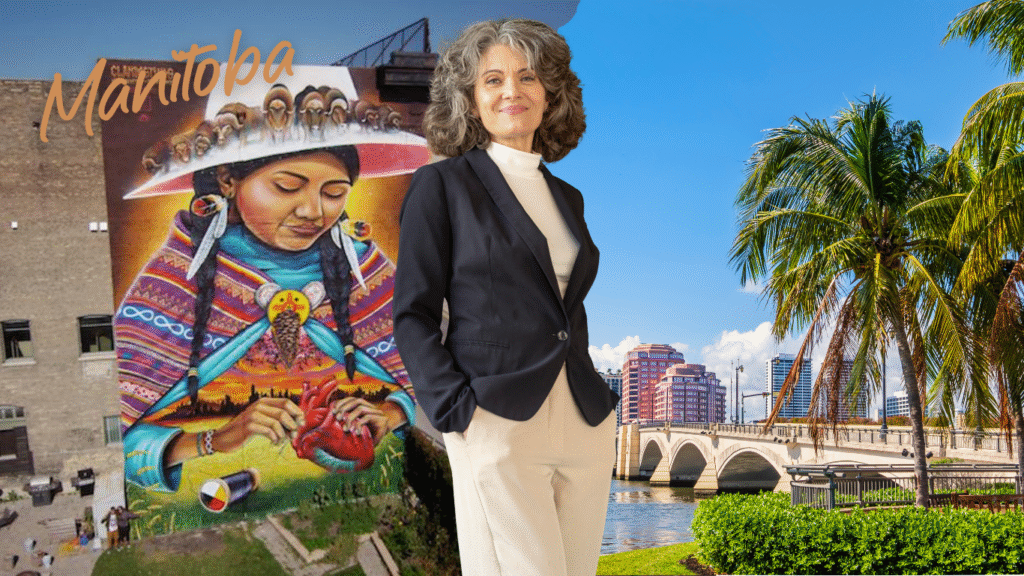 A smiling woman in a suit stands between a colourful mural of an Indigenous woman in traditional clothing and a sunny Manitoba cityscape with palm trees, a bridge, and buildings under a blue sky. "Manitoba" is written in cursive in the top left.